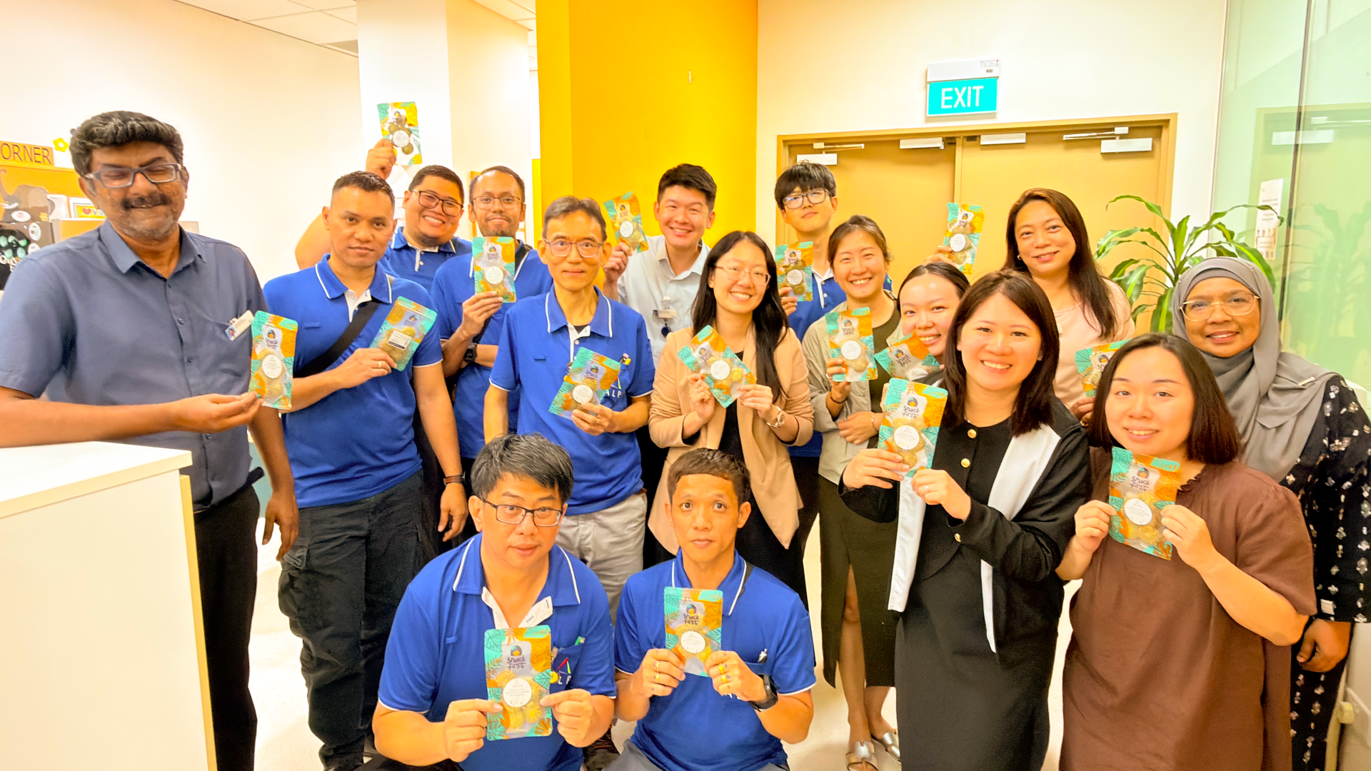 Image of ALPS staff with their Hari Raya festive goodies 